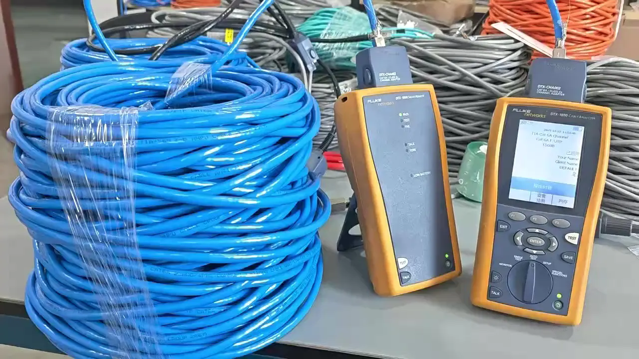 Cat6 cable coil connected to Fluke DTX cable analyzers during performance testing